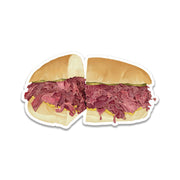 Split pastrami sandwich on bread on a white background The Hat Restaurant Los Angeles